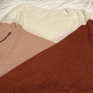 Maurice’s sweater some wear